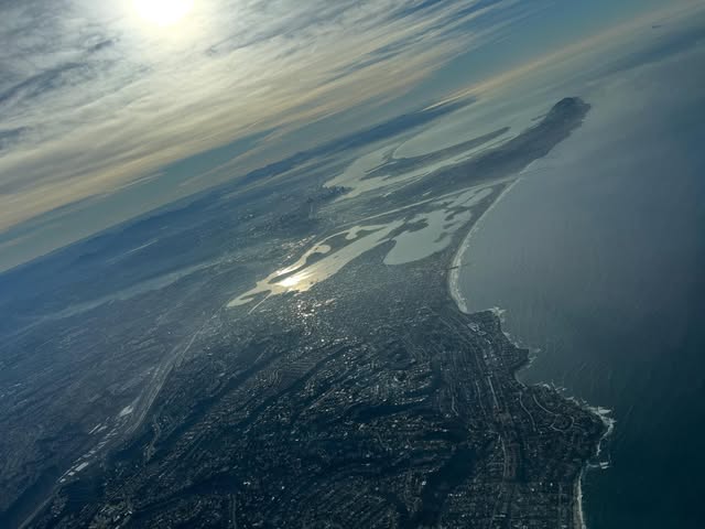 San Diego from high altitude, with Mission Bay, San Diego Bay and Point Loma stretching into the Pacific