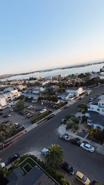 FPV drone flight over Pacific Beach, California at sunset