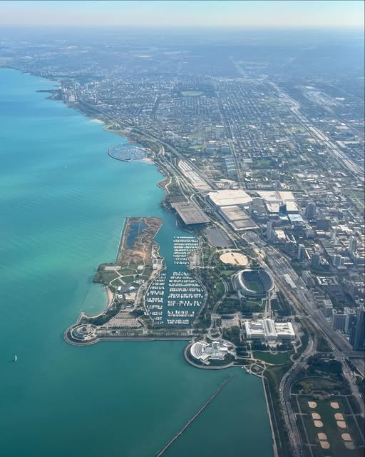 Aerial view of Chicago's lakefront, the old Meigs Field peninsula and the turquoise water of Lake Michigan